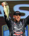 Professional angler Aaron Martens sharing his catch with the crowd at the Louisiana Sports Arena