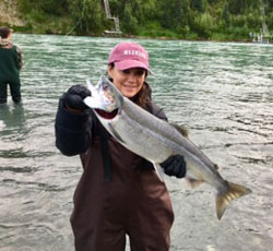 Cajun Invasion - Linda with a sockeye salmon