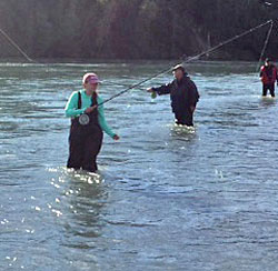 Cajun Invasion - wading in the Kenai River in Alaska after salmon