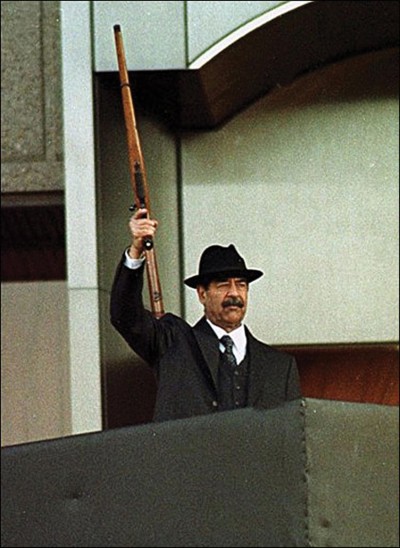 Saddam Hussein’s with his Ruger M77 bolt-action rifle